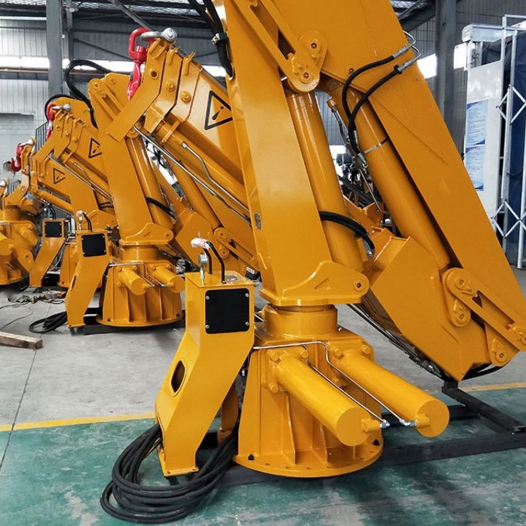 Knuckle boom cranes that can rotate continually 360 degrees